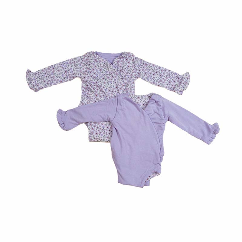 Reversible baby pink gingham design ruffle cuff long sleeve winged bodysuit.