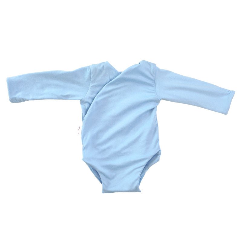 Reversible Sailboat Shores design long sleeved winged bodysuit in classic brushed fabric.