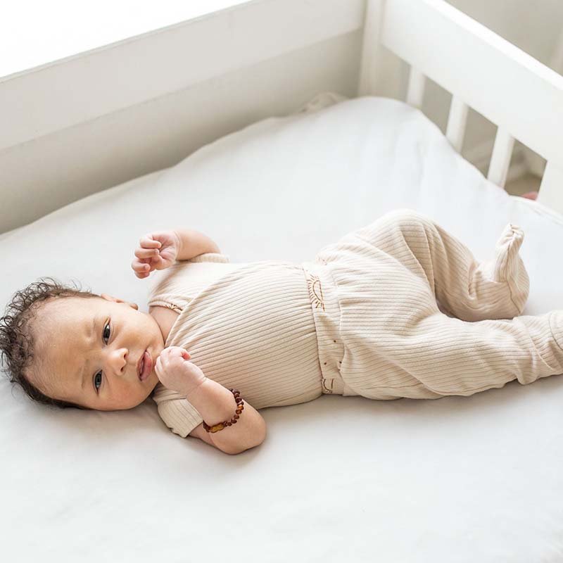 Reversible baby footie pants designed in bamboo cotton fabric featuring our Sandy Sunsets design.