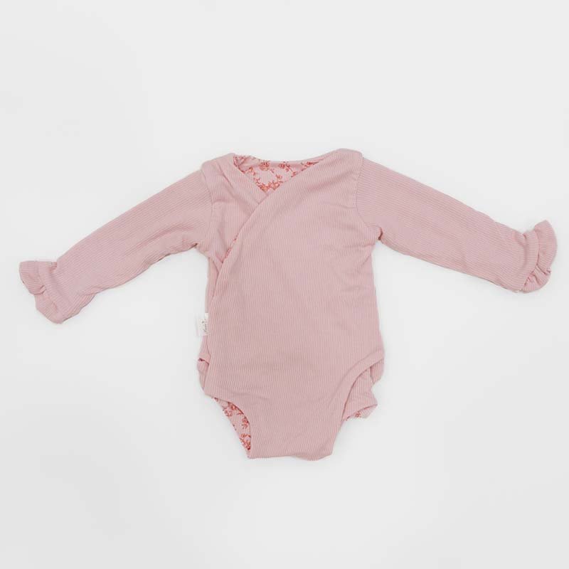 Reversible ruffle cuff baby winged bodysuit in Bitty Pink Blooms design.