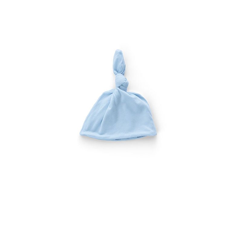 Reversible bamboo cotton baby beanie in teddy tiles design.