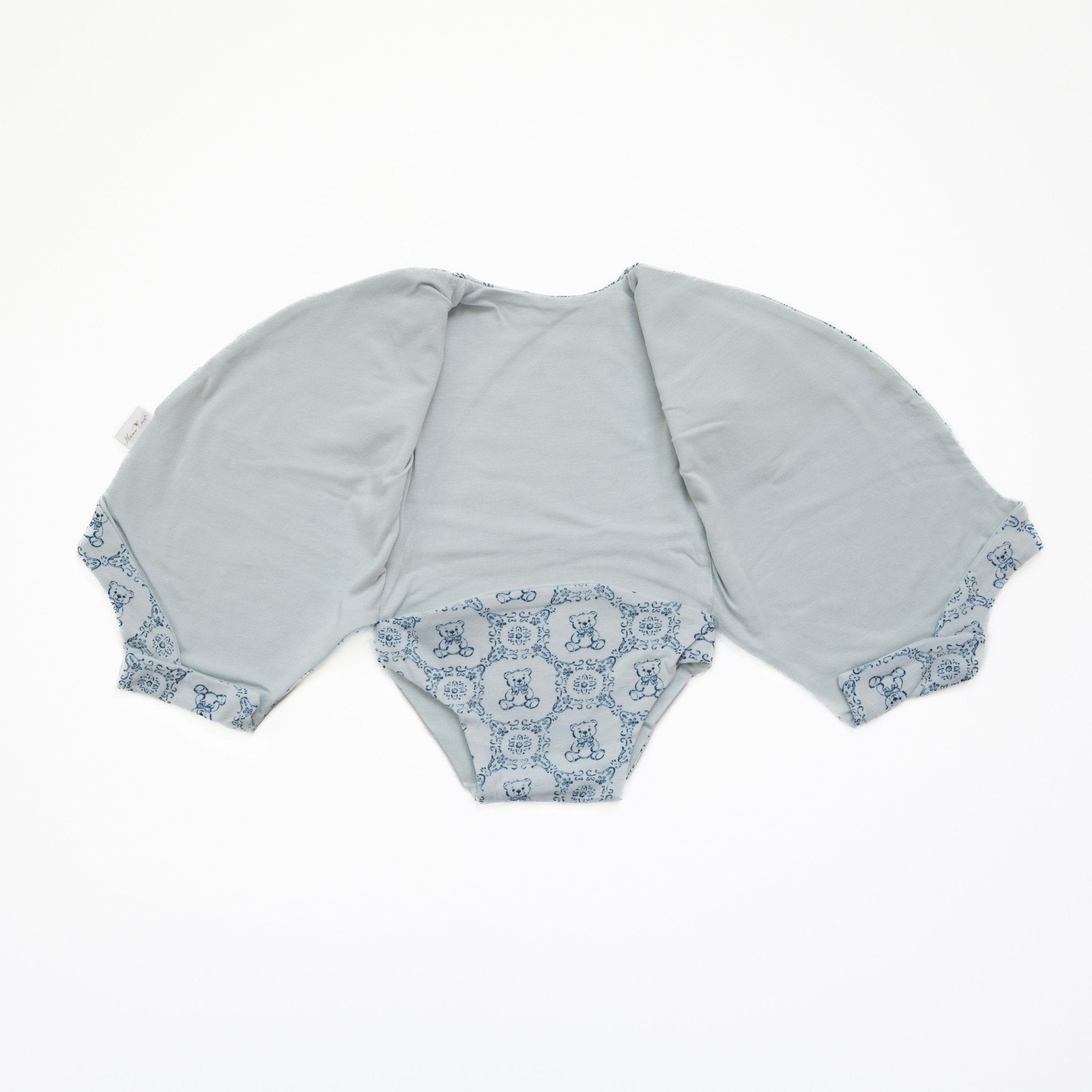 Reversible teddy tiles design short sleeve baby bodysuit in bamboo cotton fabric.