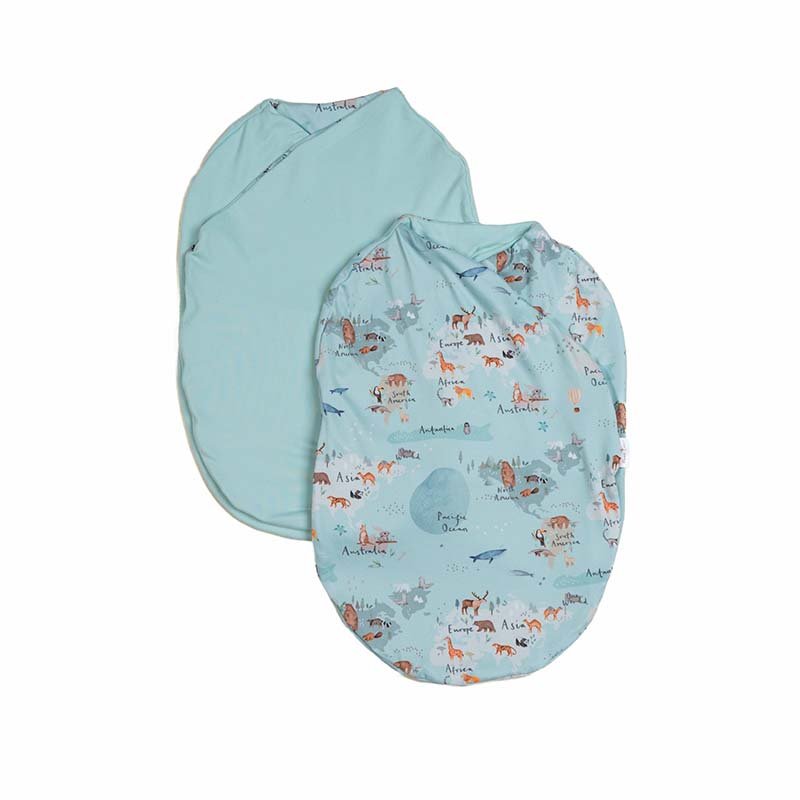 Reversible World Traveler design baby cocoon swaddle.