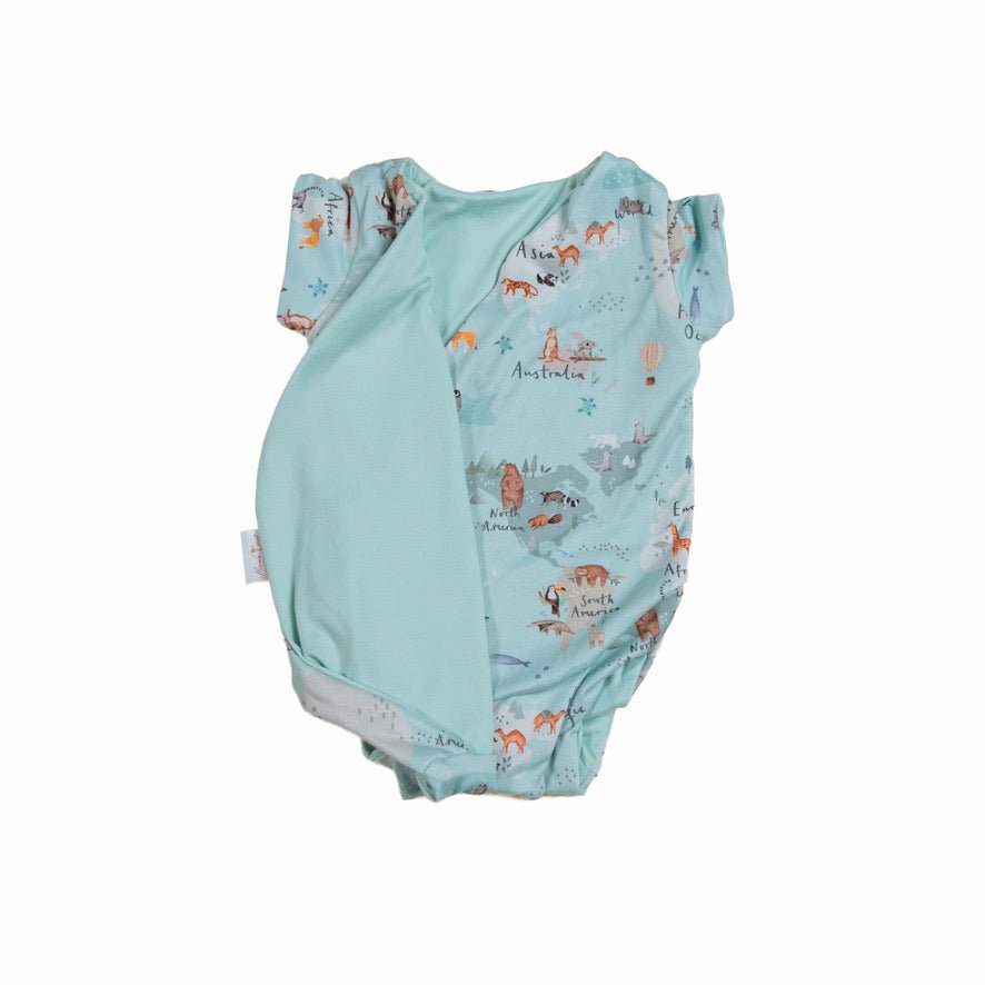 Reversible world traveler design short-sleeve baby onesie in classic brushed fabric.