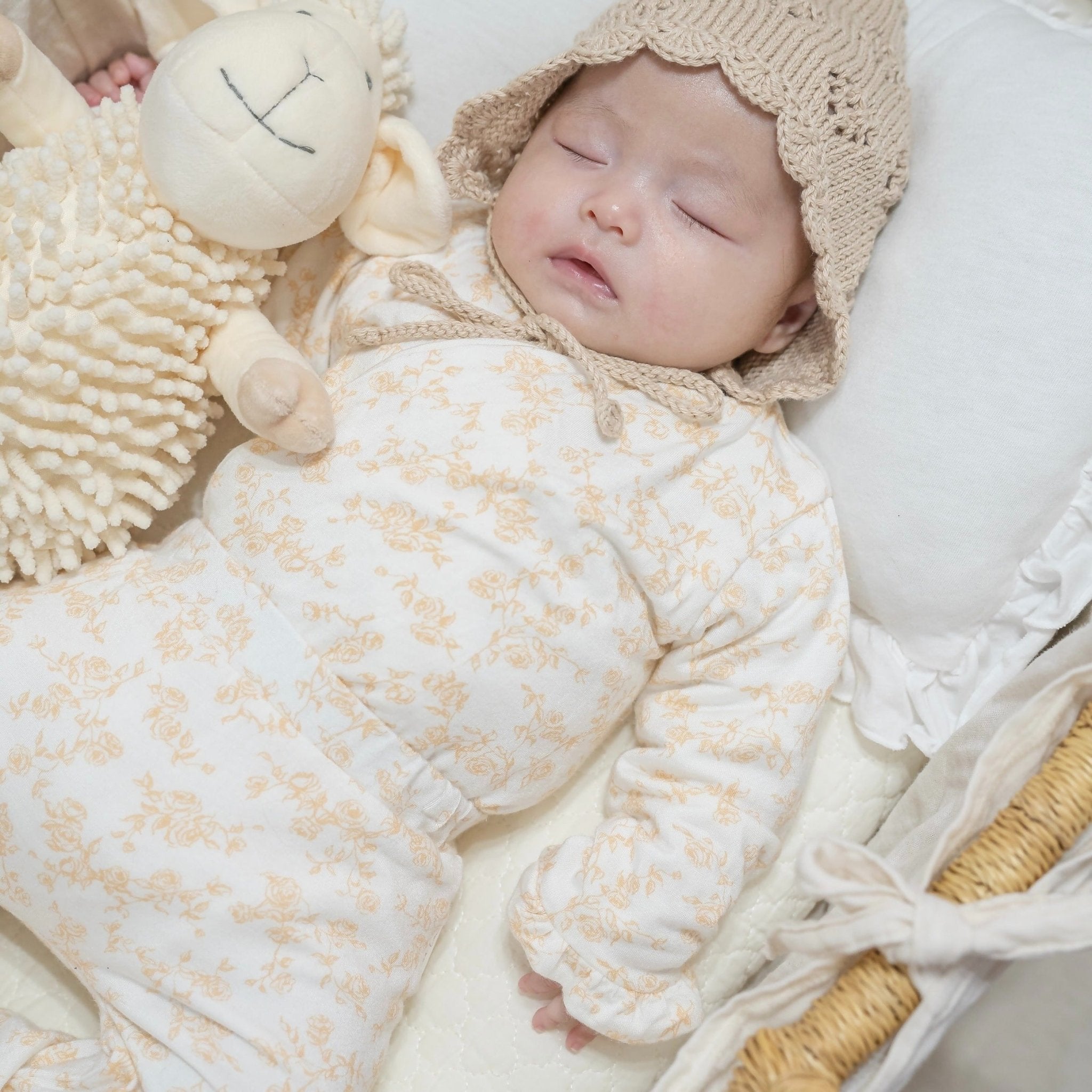 Ruffle cuff long sleeve baby onesie outfit bundle made from silky modal fabric in bitty blooms design.