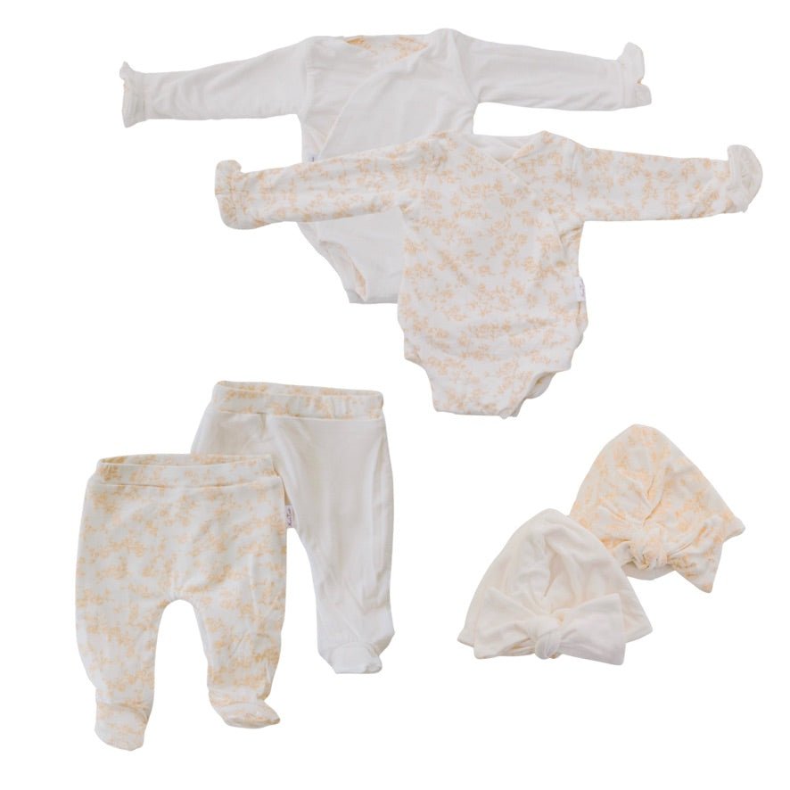 Reversible baby ruffle cuff long sleeve baby onesie outfit bundle made from silky modal fabric in bitty blooms design.
