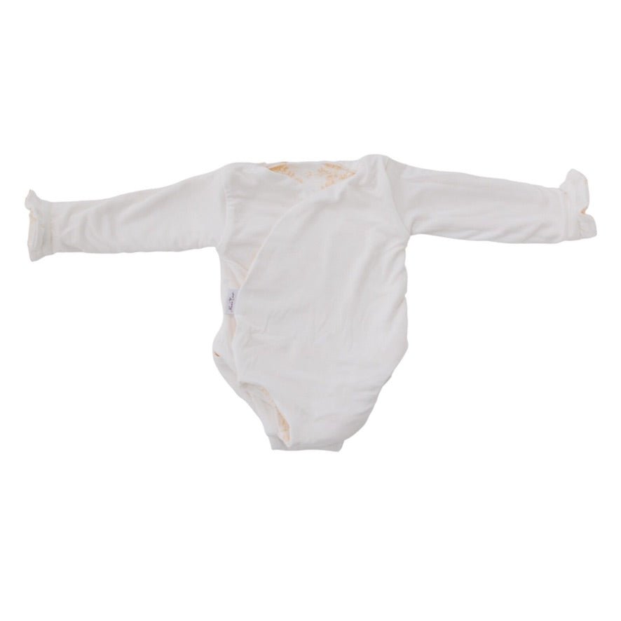 Reversible ruffle cuff baby winged bodysuit in Bitty Blooms design.