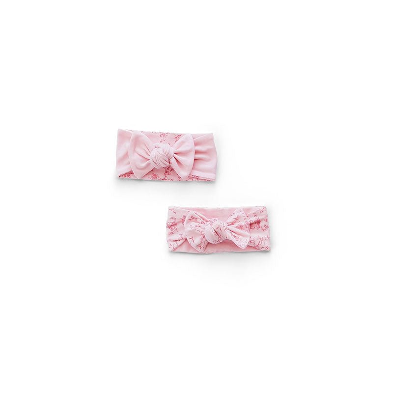 Baby headwraps in whimsical garden design, finished with a matching bow and crafted from bamboo and organic cotton fabric.