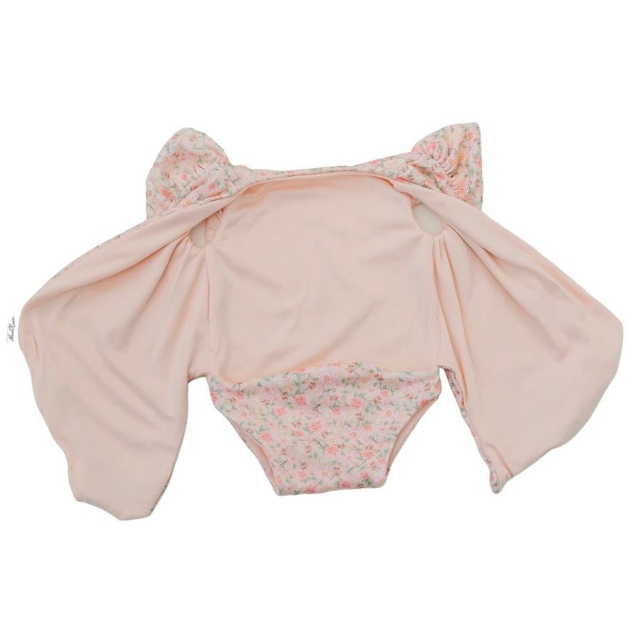 Reversible short-sleeve bodysuit for baby showcasing Dusty Roses in premium brushed fabric.