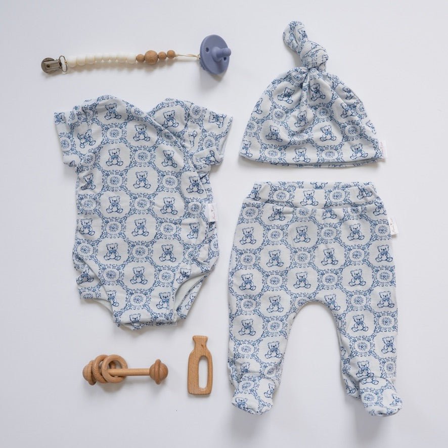 Short-sleeve baby onesie outfit bundle made from bamboo cotton in teddy tiles design.