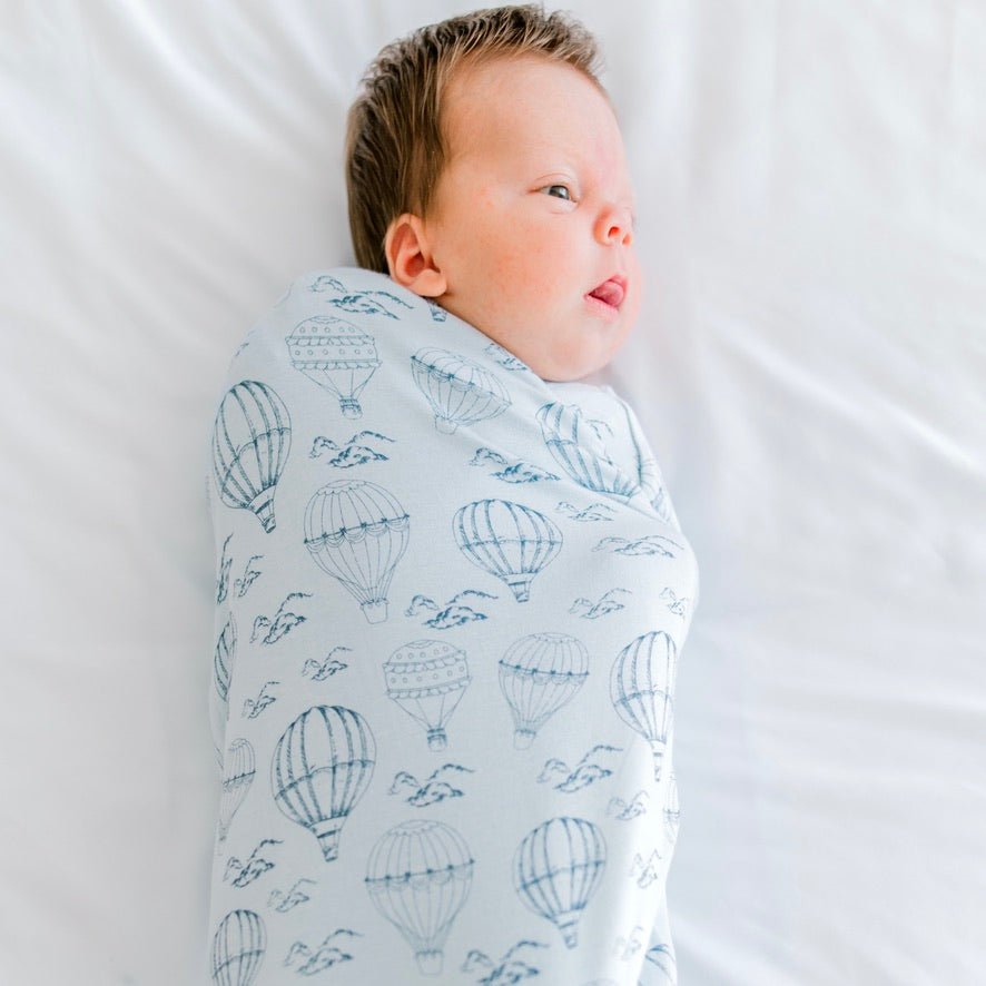 Bamboo cotton short sleeve newborn essentials bundle in bon voyage design.