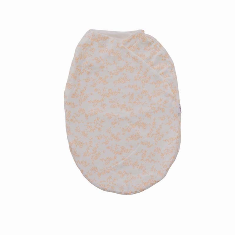 Soft floral Bitty Blooms design on a Cocoon swaddle baby blanket in Silky Modal fabric styles.