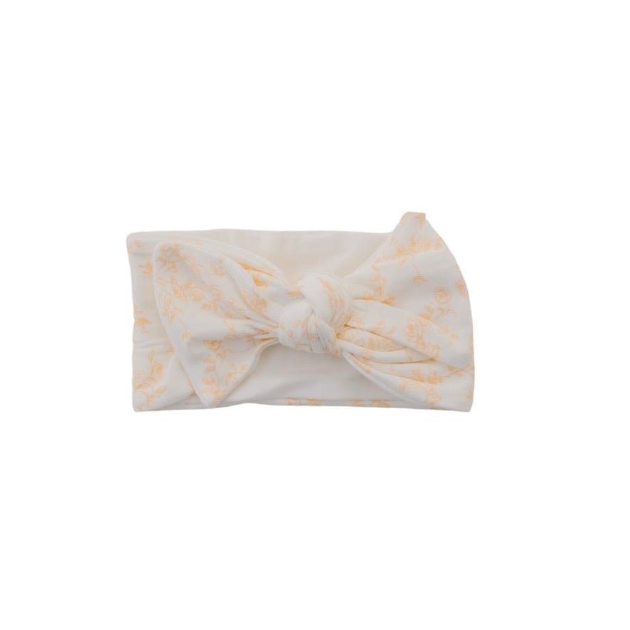 Charming headwrap with decorative bow in Bitty Blooms styles.