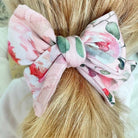 Boutique baby headband and bow clip in Peachy Rose Fields Classic Brushed fabric.