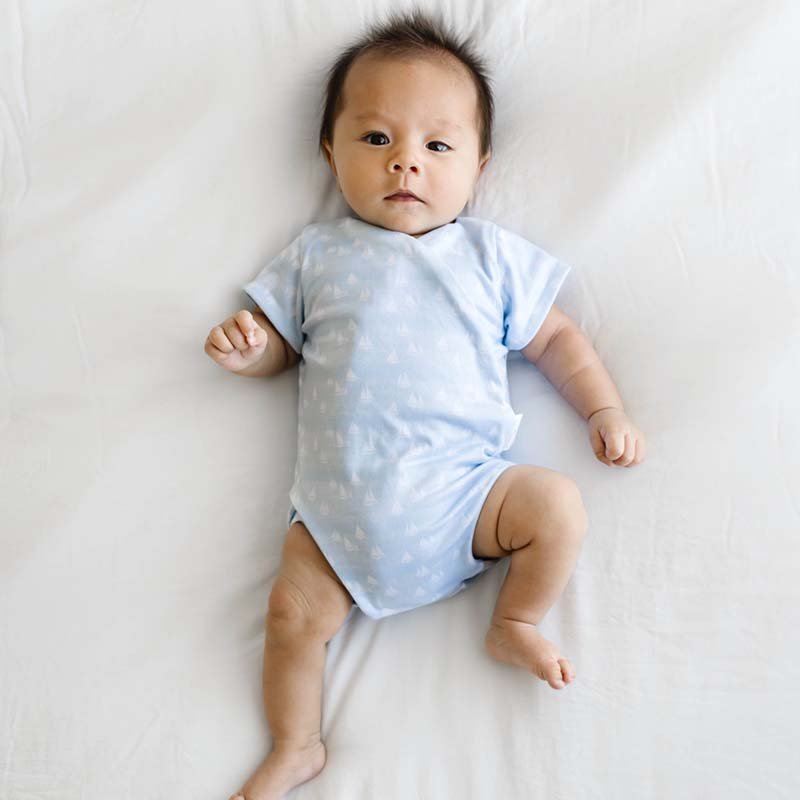 Short-sleeve winged bodysuit featuring the Sailboat Shores print in cozy classic brushed fabric.