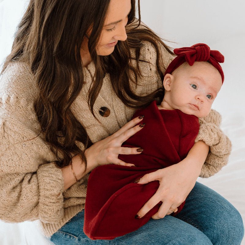 Reversible baby cocoon swaddle blanket for newborns.