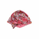 Infant accessory featuring a ruched beanie with bow for babies in Flower Power design.