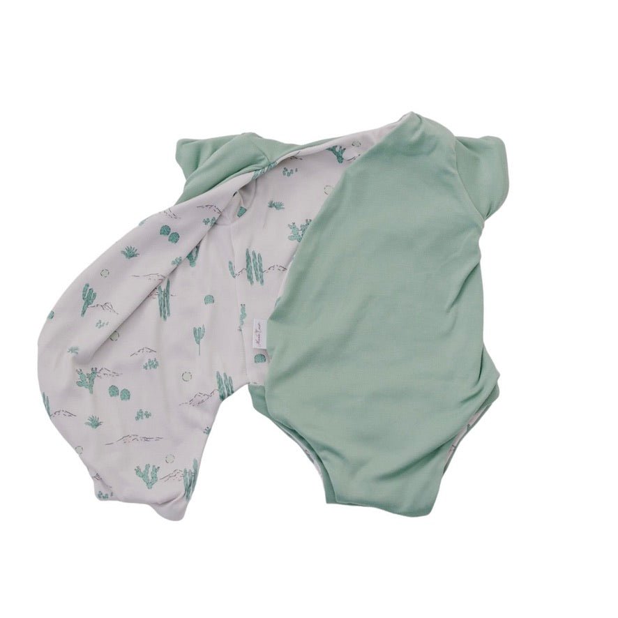 Desert Sunsets reversible short-sleeve winged bodysuit made from classic brushed fabric for a gentle fit.