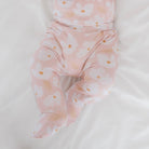 Cozy baby footie pants in bamboo organic cotton fabric with an adorable Sweet Lily pattern.