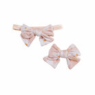 Sweet Lily baby headband with bow crafted in cozy Classic Brushed fabric styles.