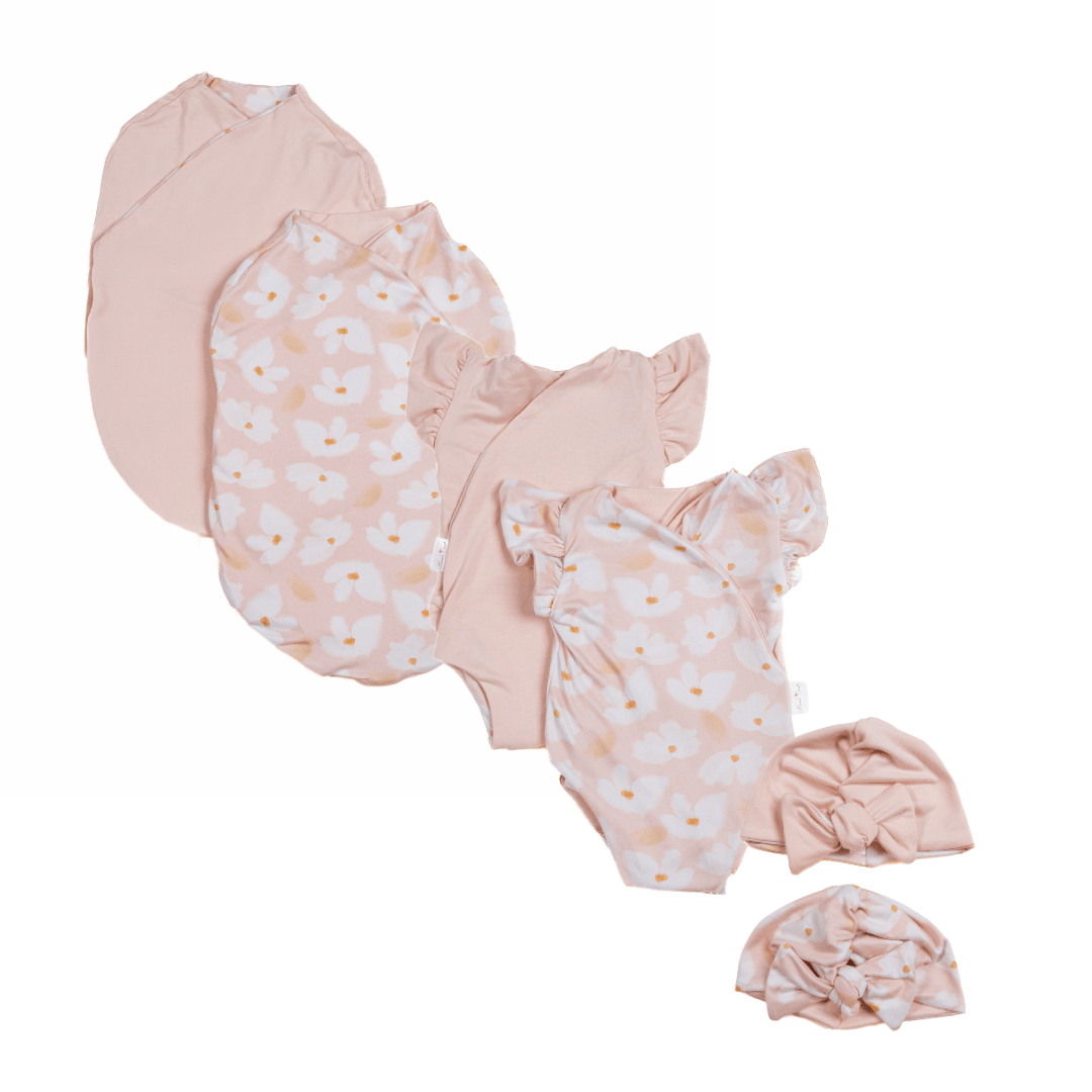 Newborn essentials bundle with flutter sleeves in classic brushed fabric with sweet lily design.