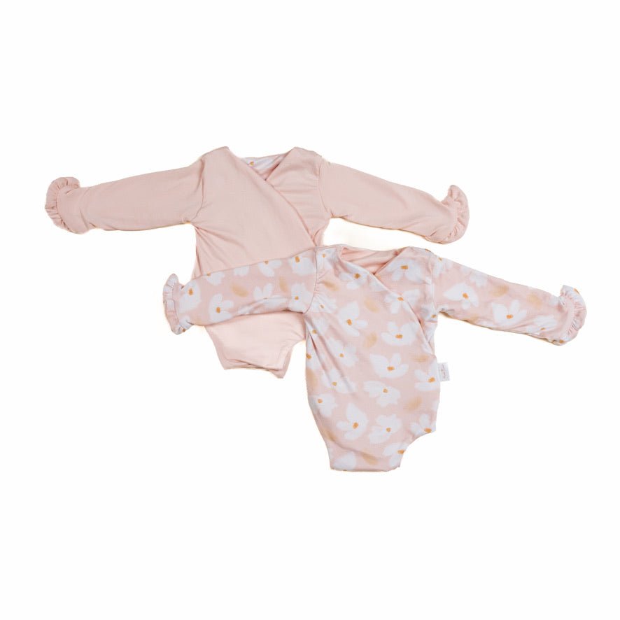 Reversible ruffle cuff baby bodysuit with wings in Sweet Lily design classic brushed fabric for babies.