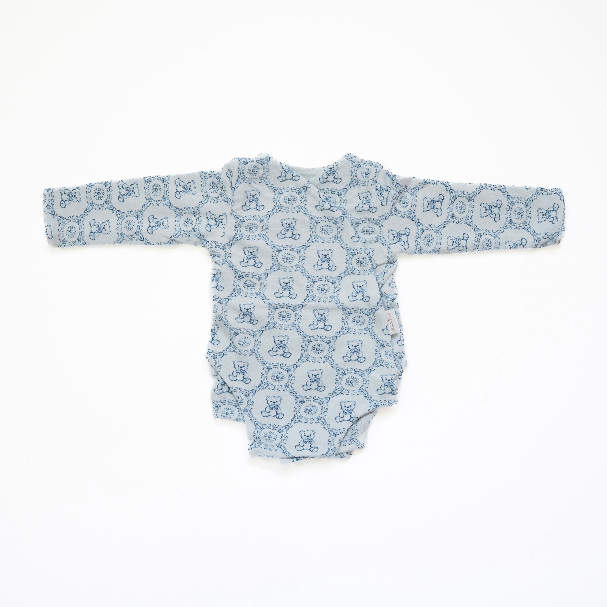 Long-sleeve winged bodysuit for babies.