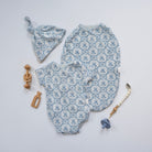 Newborn bundle with short sleeve essentials in bamboo cotton fabric with teddy tiles design.