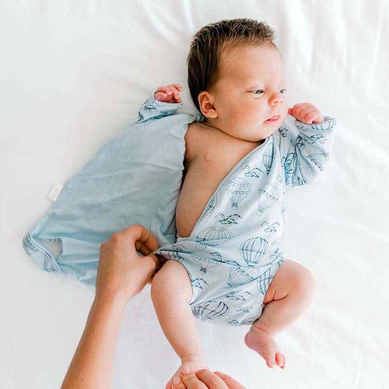 Long-sleeve winged bodysuit for babies.
