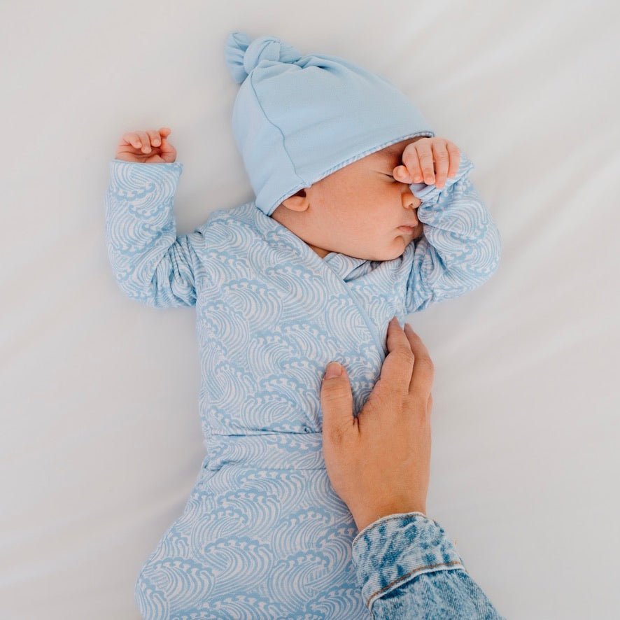 Blue Swells design baby winged bodysuit in classic brushed fabric.