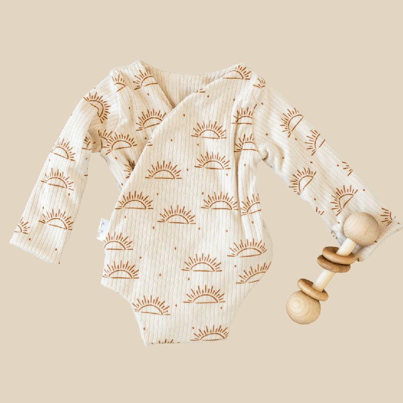 Sandy Sunsets design baby winged bodysuit in classic brushed fabric.
