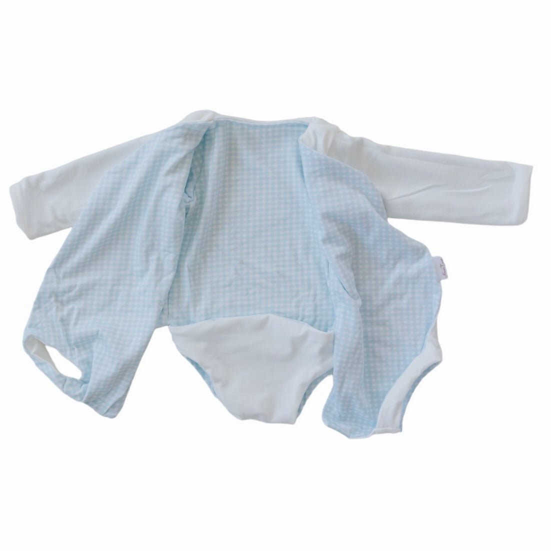 Long sleeved reversible winged bodysuit for babies in silky modal fabric.