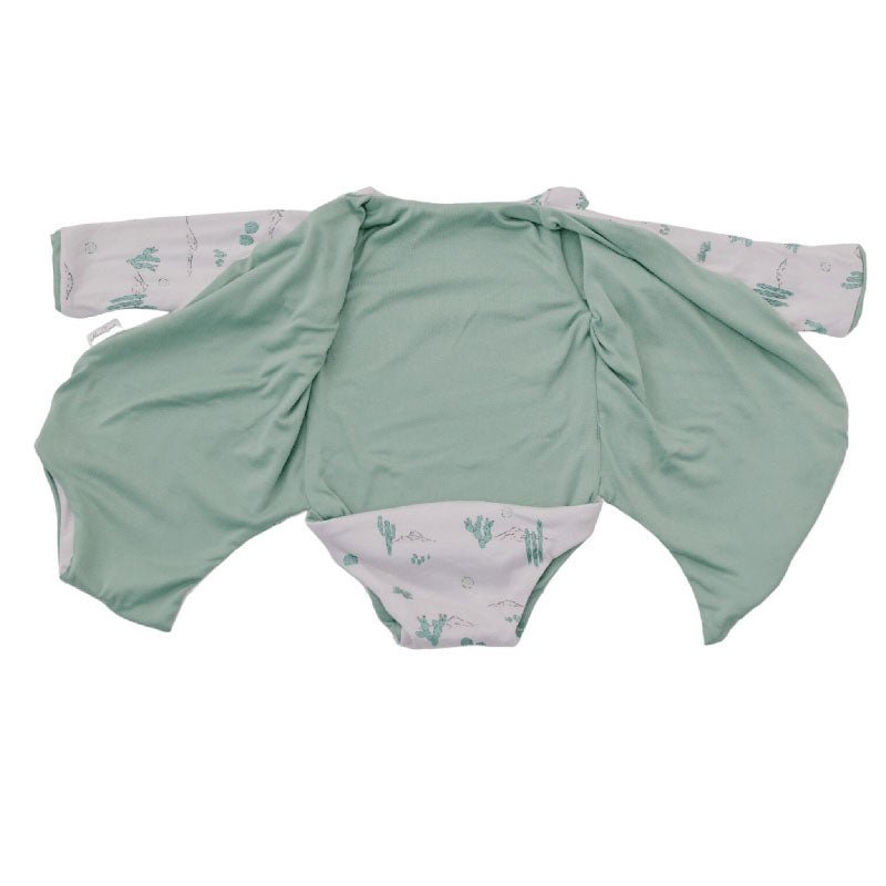 Long sleeved reversible winged bodysuit for babies in classic brushed fabric.