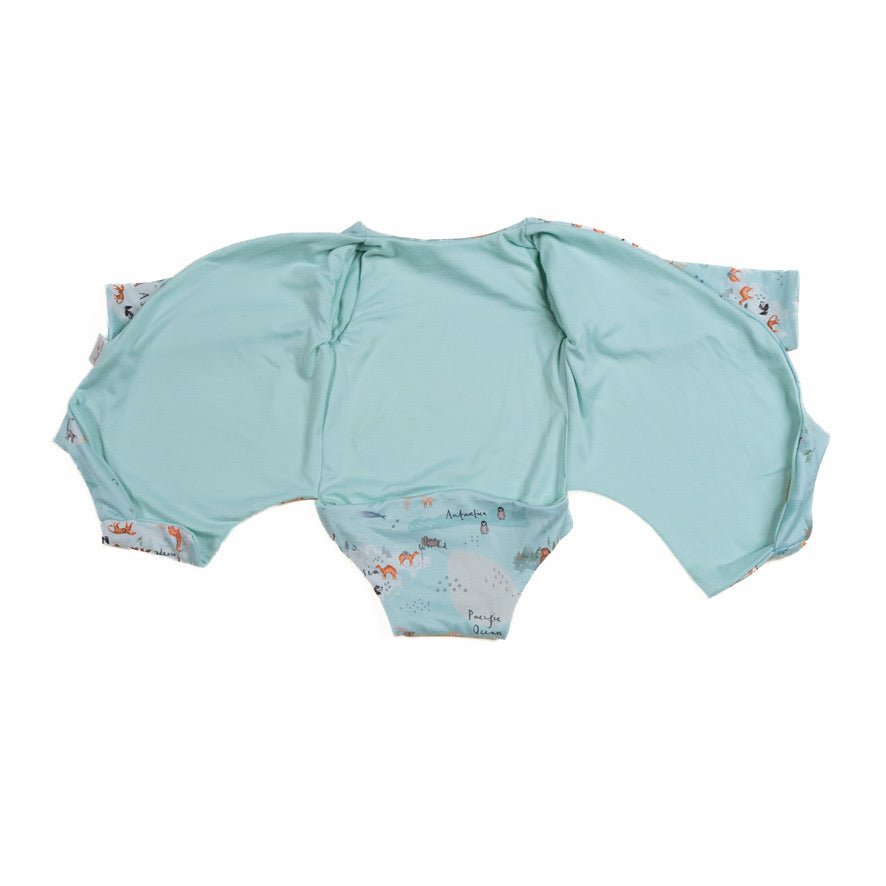 Long sleeved reversible winged bodysuit for babies in classic brushed fabric.