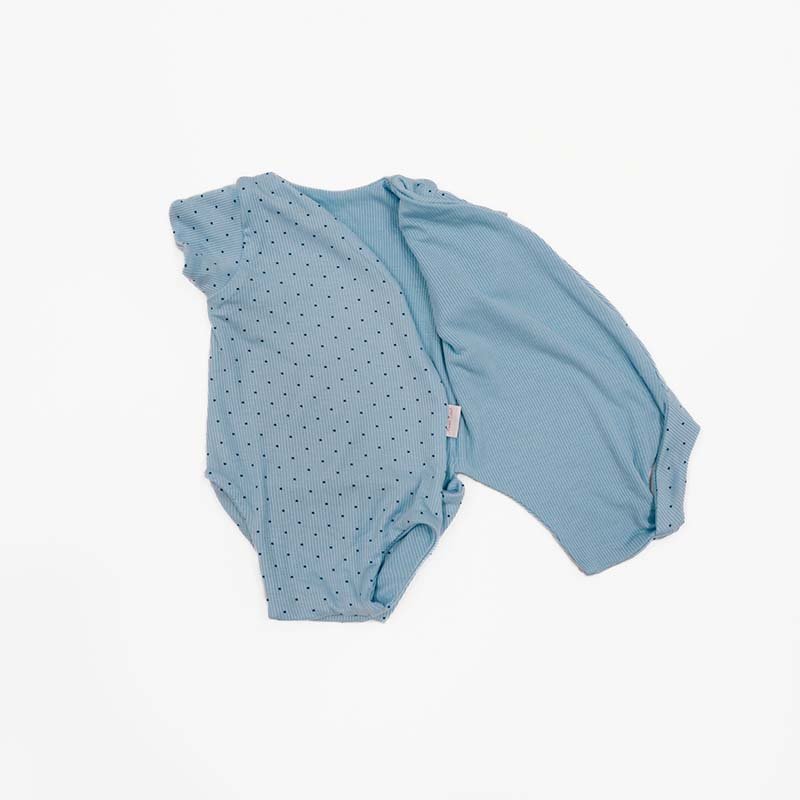 Reversible Dotted Blues design short sleeved winged bodysuit in silky modal fabric.