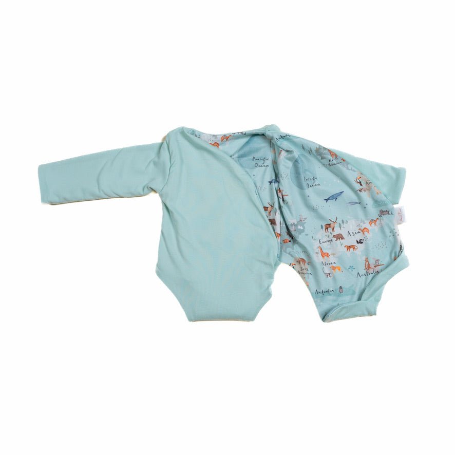 Long sleeved reversible winged bodysuit for babies in classic brushed fabric.