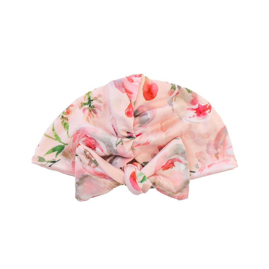 Adorable ruched beanie with bow for babies in Peachy Rose Fields with a soft stretchy fit.
