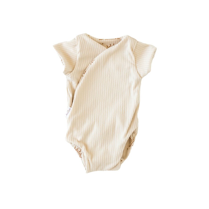 Everyday reversible short-sleeve winged bodysuit with Sandy Sunsets print and classic brushed softness.