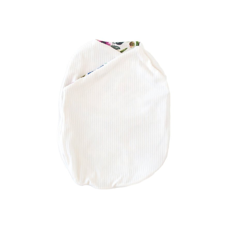 Cozy Silky Modal Ivory Wildflowers baby cocoon swaddle for infants.