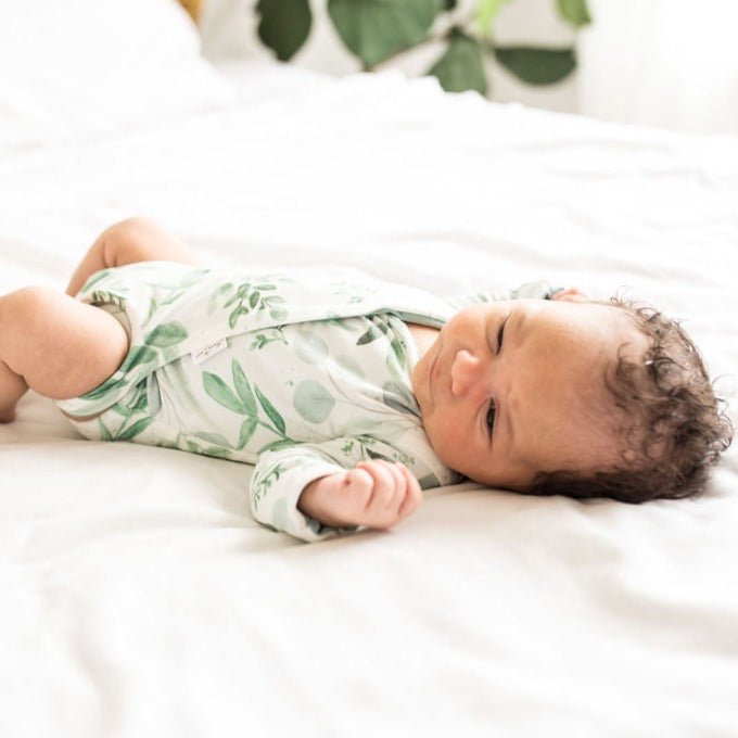 Saged Eucalyptus design long sleeve winged bodysuit.