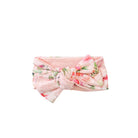 Soft and elegant headwrap with bow in Peachy Rose Fields fabric.