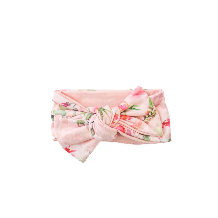 Soft and elegant headwrap with bow in Peachy Rose Fields fabric.