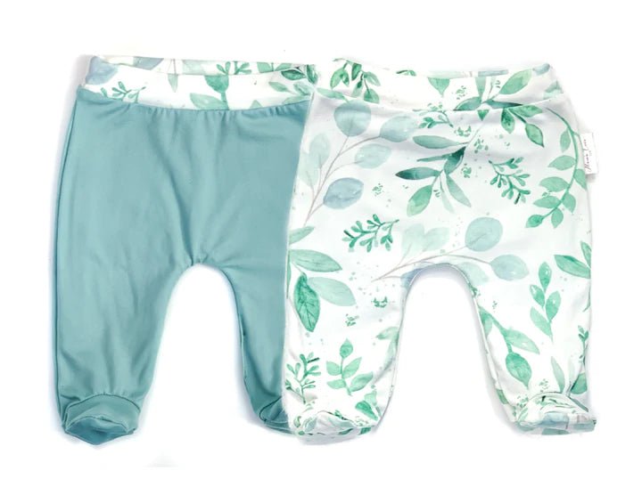 Reversible footie pants in saged eucalyptus design.