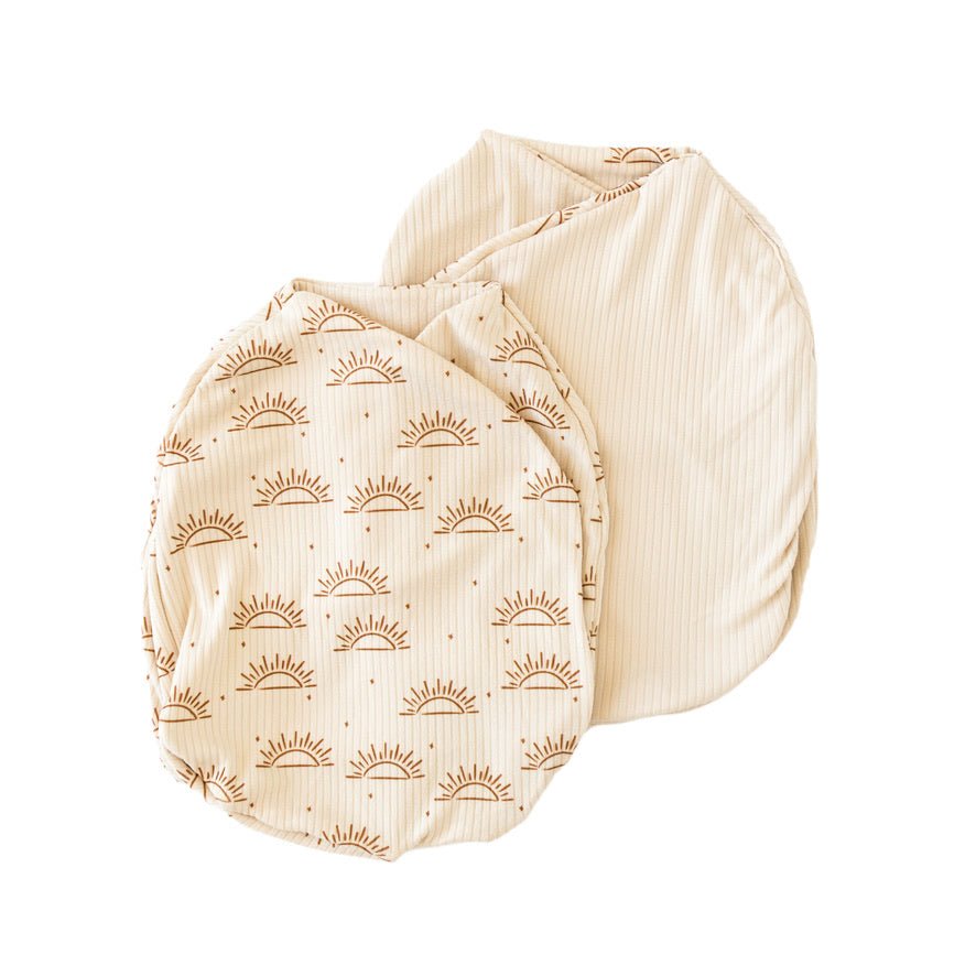 Reversible Sandy Sunsets design baby cocoon swaddle.