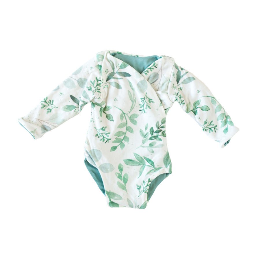 Long sleeved winged bodysuit for babies in classic brushed fabric.