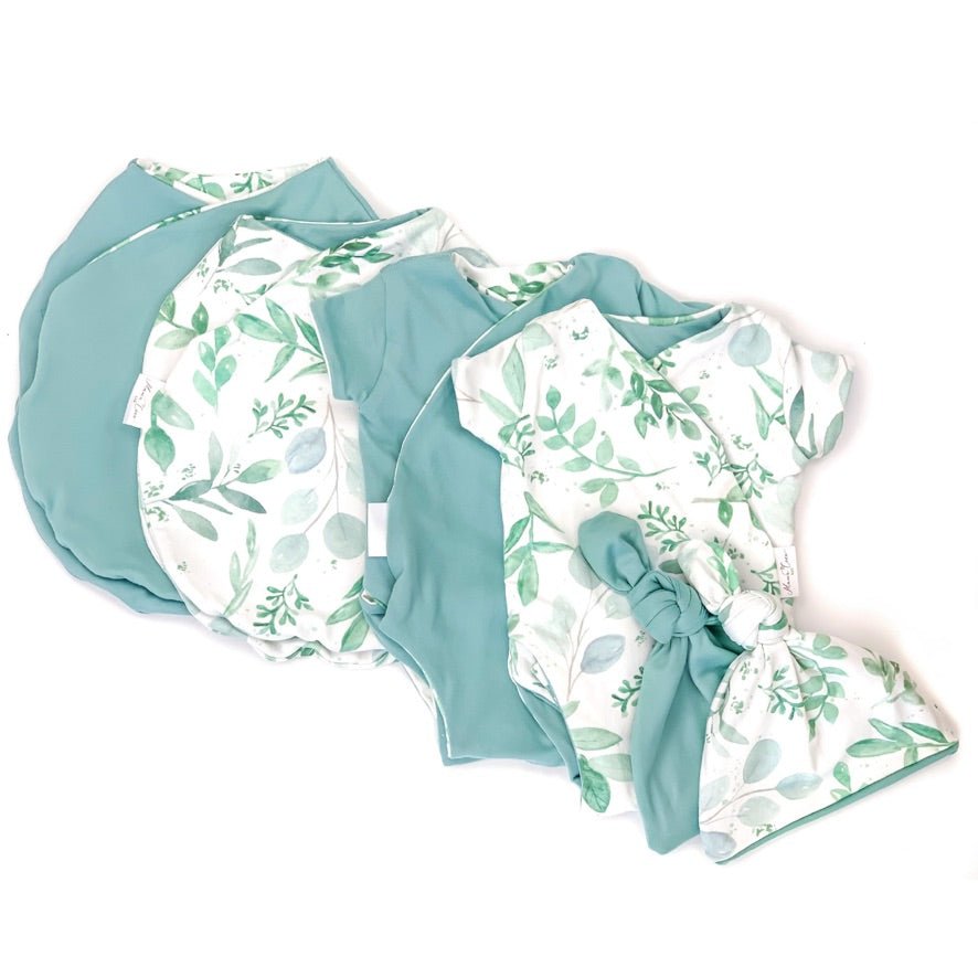 Newborn essentials bundle with short sleeves in classic brushed fabric with saged eucalyptus design.