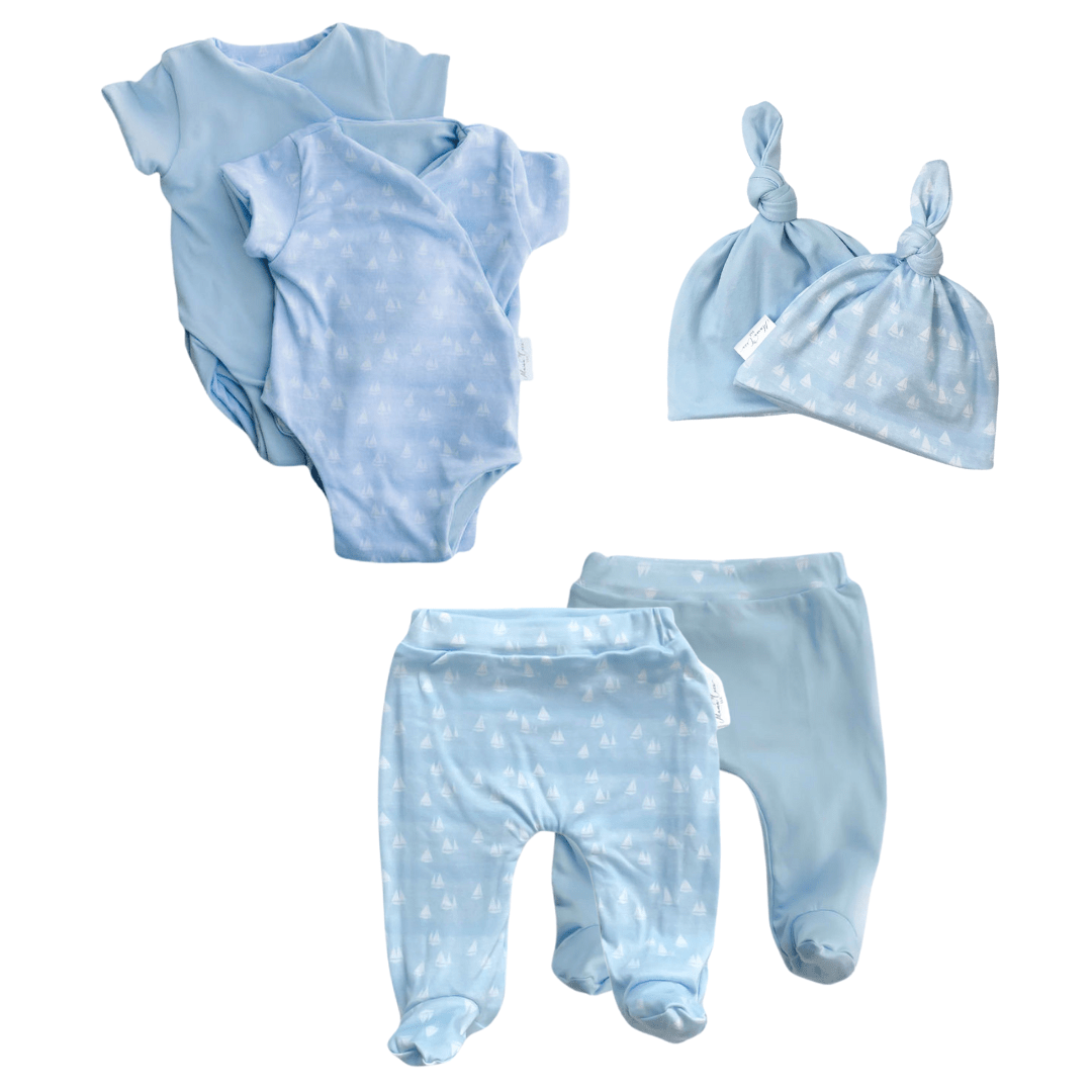 Reversible short-sleeve onesie outfit bundle in sailboat shores design.
