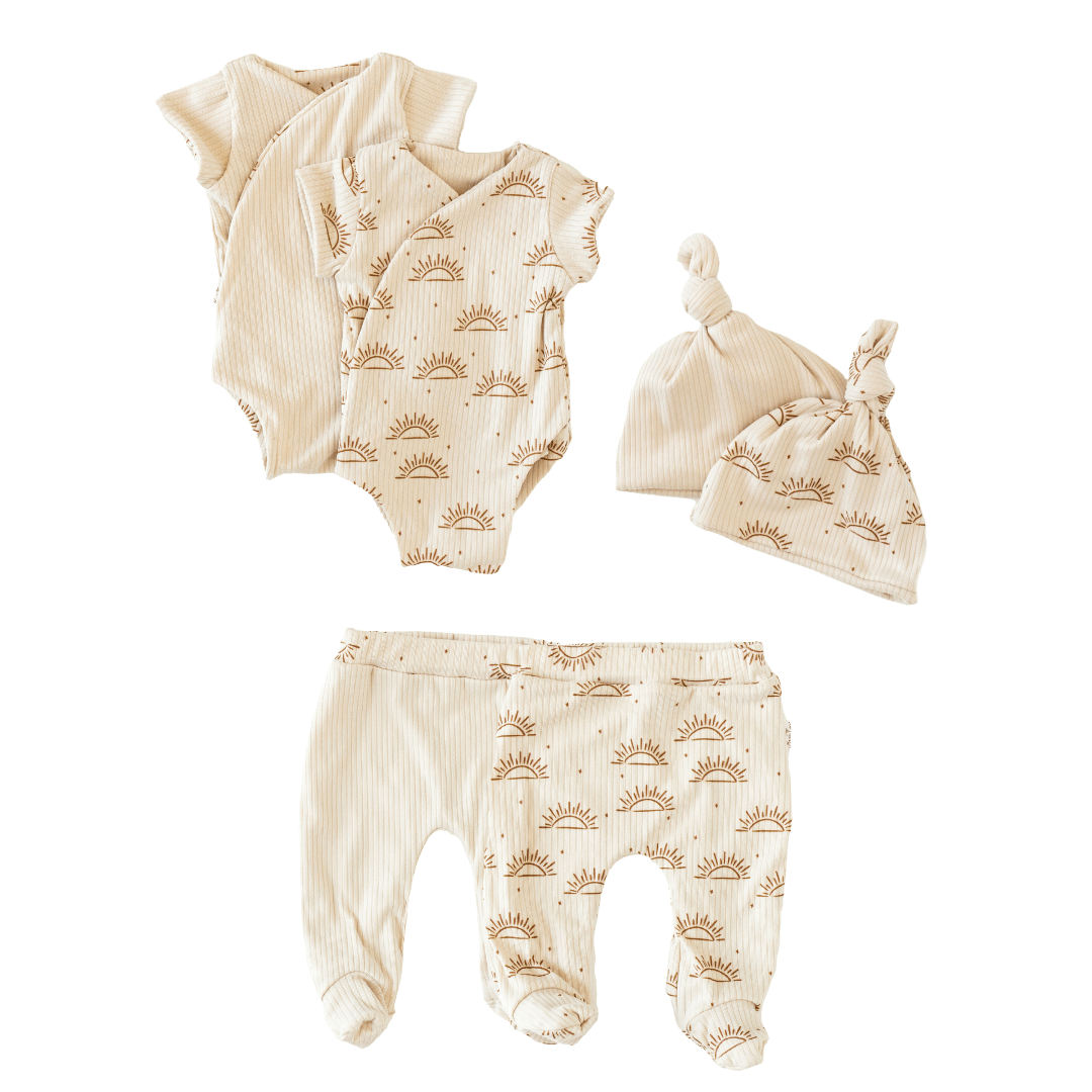 Short-sleeve onesie outfit bundle in sandy sunsets design.