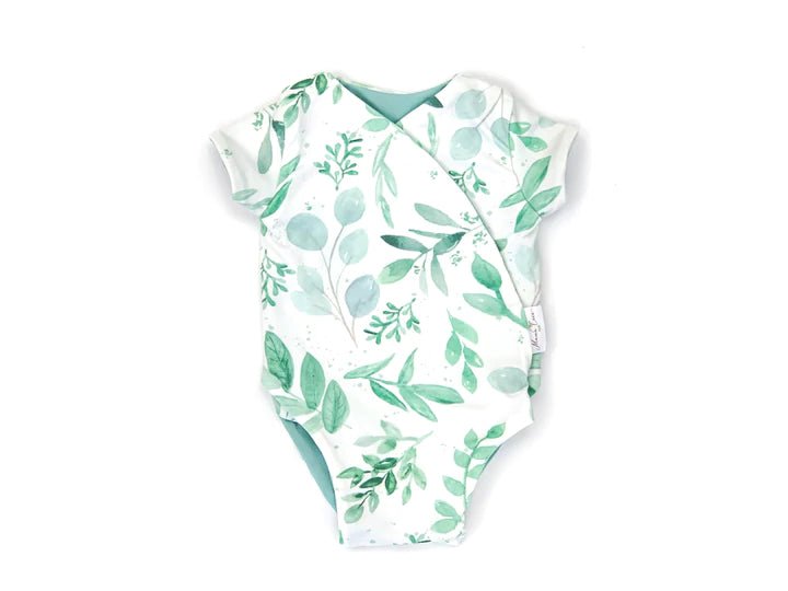 Classic brushed short-sleeve winged bodysuit with a gentle Saged Eucalyptus print for everyday comfort.
