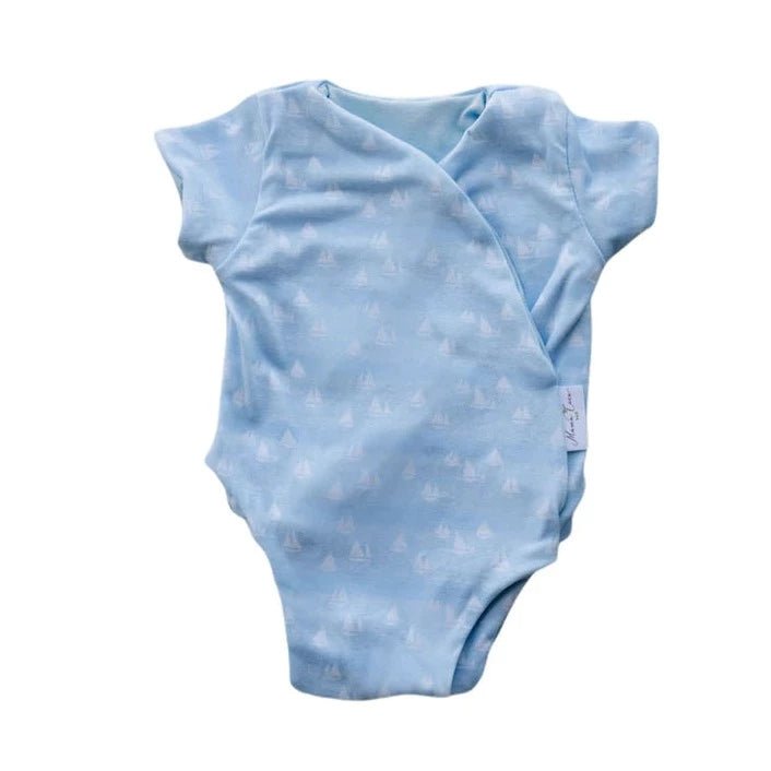 Soft classic brushed short-sleeve winged bodysuit in the Sailboat Shores design for comfortable everyday wear.